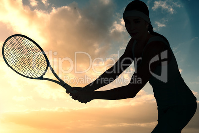 Composite image of female athlete playing tennis