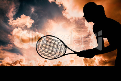 Composite image of tennis player playing tennis with a racket