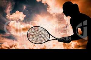 Composite image of tennis player playing tennis with a racket