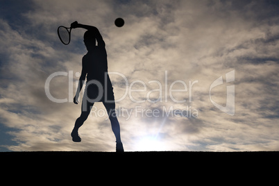 Composite image of athlete playing tennis with a racket