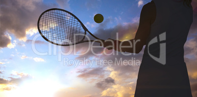 Composite image of athlete playing tennis with a racket