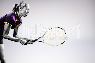 Composite image of tennis player playing tennis with a racket