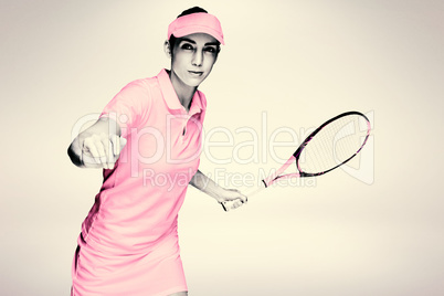 Composite image of female athlete playing tennis