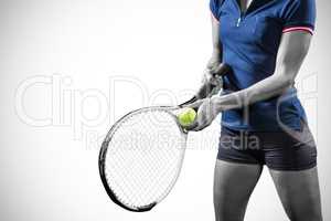 Composite image of tennis player holding a racquet ready to serv