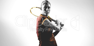 Composite image of tennis player playing tennis with a racket