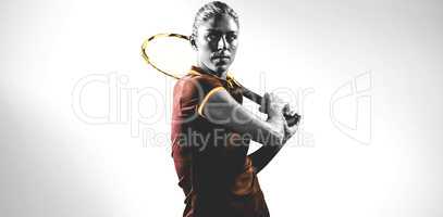 Composite image of tennis player playing tennis with a racket