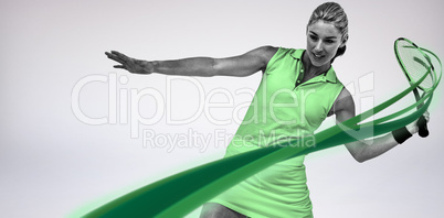 Composite image of athlete playing tennis with a racket