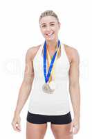 Female athlete wearing medals