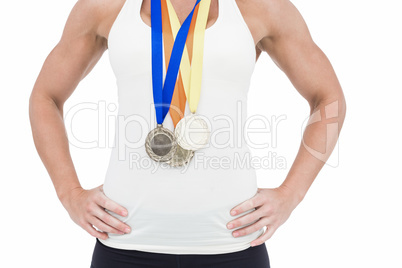 Female athlete wearing medals