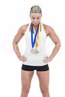 Female athlete wearing medals