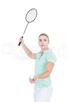 Pretty blonde playing badminton