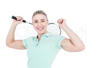 Pretty blonde playing badminton