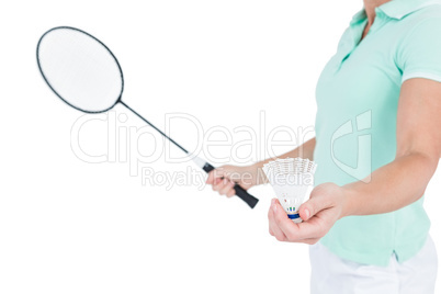 Pretty blonde playing badminton