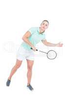 Pretty blonde playing badminton