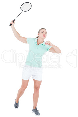 Pretty blonde playing badminton