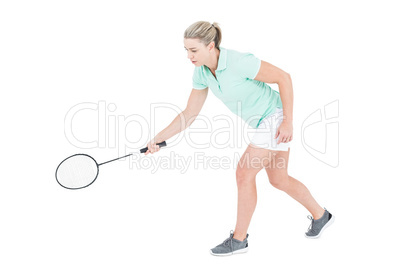 Pretty blonde playing badminton