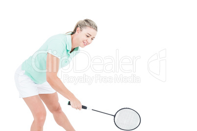 Pretty blonde playing badminton