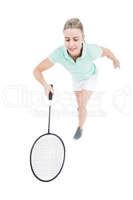 Pretty blonde playing badminton