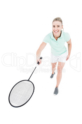 Pretty blonde playing badminton