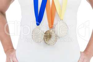 Female athlete wearing medals