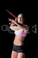 Female athlete throwing a javelin