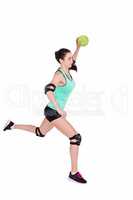 Female athlete with elbow pad throwing handball