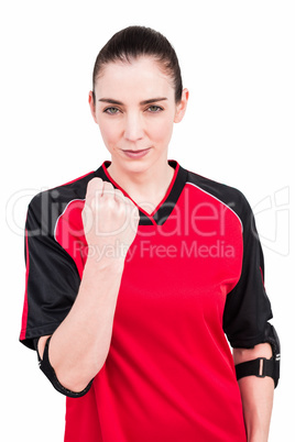 Female athlete posing with elbow pad