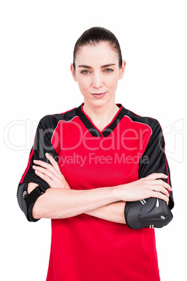 Female athlete posing with elbow pad
