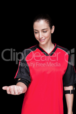 Female athlete posing with elbow pad
