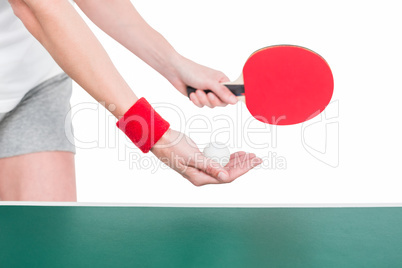 Female athlete playing ping pong