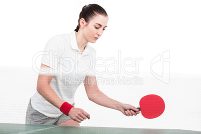 Female athlete playing ping pong