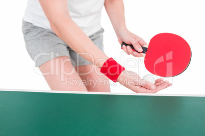 Female athlete playing ping pong