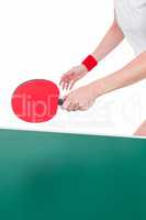 Female athlete playing ping pong