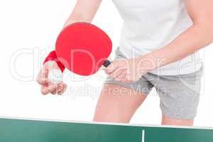 Female athlete playing ping pong