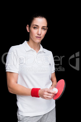 Female athlete playing ping pong