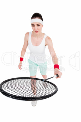 Female athlete playing badminton