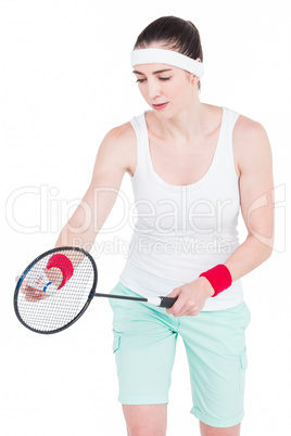 Female athlete playing badminton