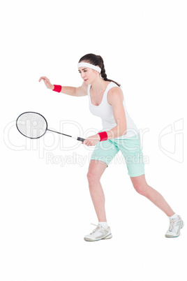 Female athlete playing badminton