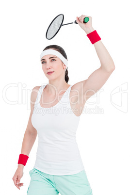 Female athlete playing badminton