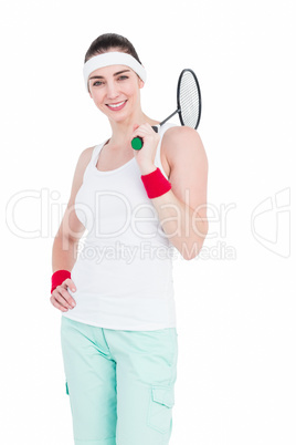 Female athlete playing badminton