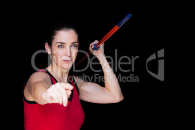 Female athlete throwing a javelin