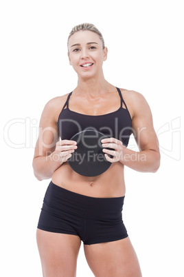 Female athlete holding discus