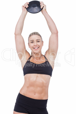 Female athlete holding discus