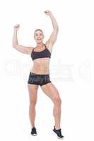 Female athlete raising arms