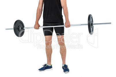 Bodybuilder lifting heavy barbell weights