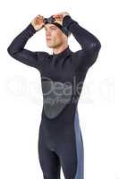 Swimmer in wetsuit wearing swimming goggles