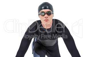 Confident swimmer in wetsuit