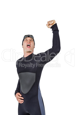 Swimmer posing after victory