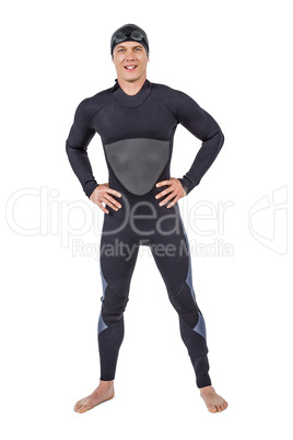 Portrait of confident swimmer in wetsuit