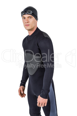 Portrait of confident swimmer in wetsuit